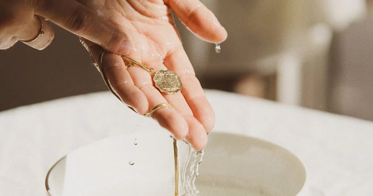 Cleaning imitation jewelry with a soft cloth